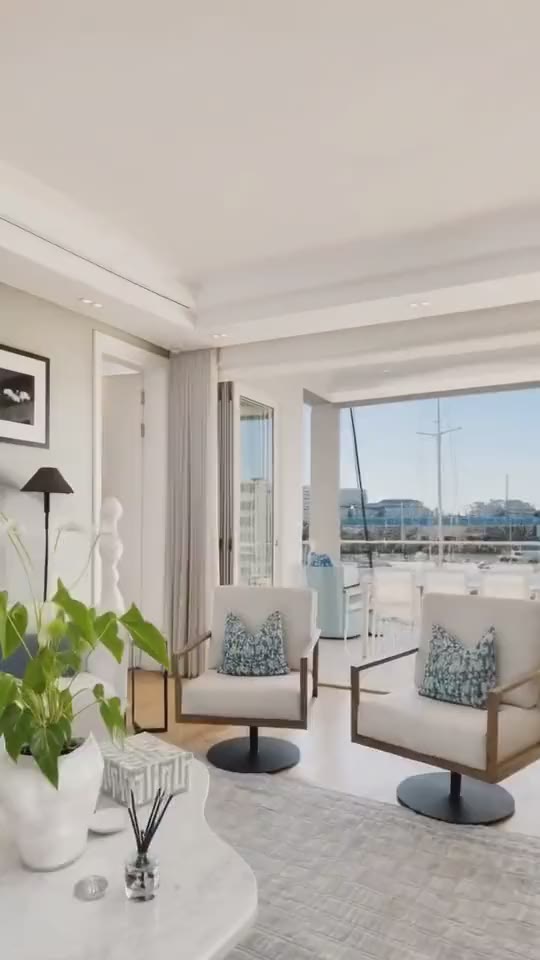 An apartment on a marina, as a vertical film.
